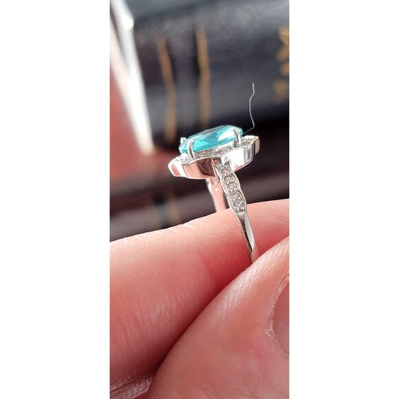 Stunning Rhodium-Plated Size 9 Ring with Aqua Blue Gemstone and Halo Accents - Picture 10 of 11